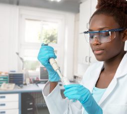 African-american,Scientist,Or,Graduate,Student,In,Lab,Coat,And,Protective